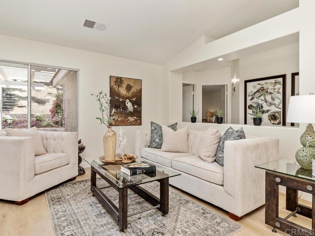1219 Sunglow Drive Oceanside, CA 92056 - Photo 9 of 40 The added Living Room allows for multiple sitting & entertaining areas.