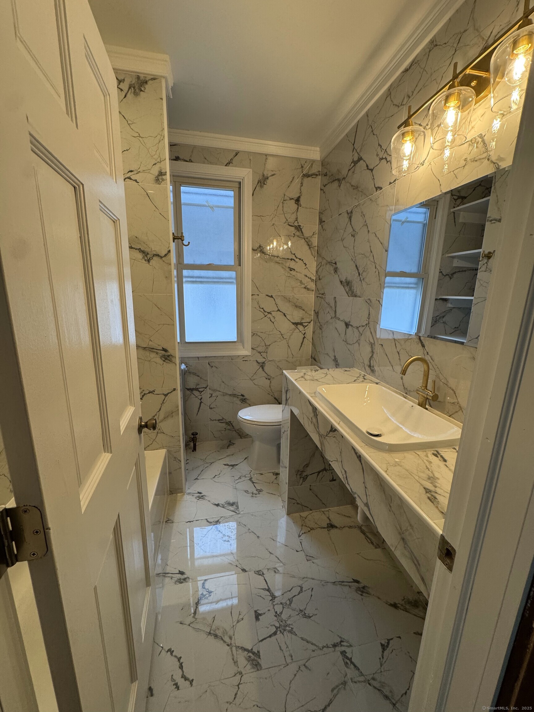 Undisclosed Address New Haven, CT 06511 - Photo 4 of 7 a bathroom with a granite countertop sink toilet and shower