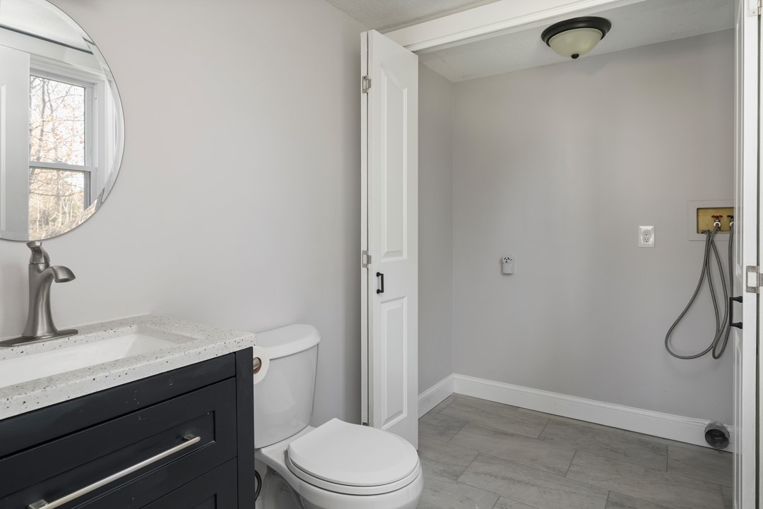8 Seawinds Terrace Westerly, RI 02891 - Photo 13 of 28 1st floor Laundry and half bath
