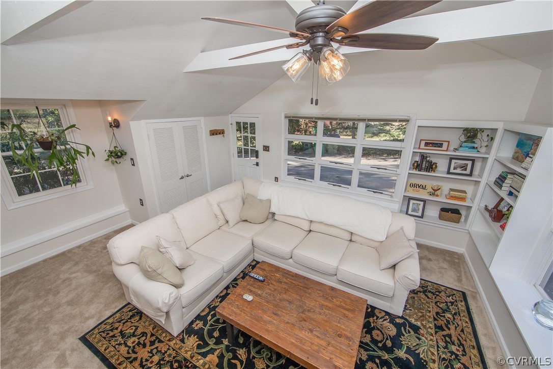 3921 Wakefield Road Richmond, VA 23235 - Photo 21 of 50 a living room with furniture and a rug