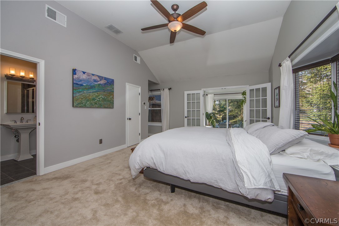 3921 Wakefield Road Richmond, VA 23235 - Photo 29 of 50 a bedroom with a large bed and a window