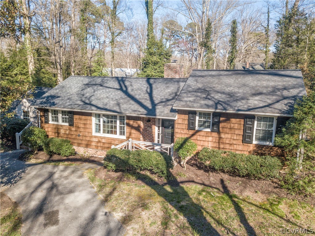 3921 Wakefield Road Richmond, VA 23235 - Photo 3 of 50 front view of house with a yard and potted plants