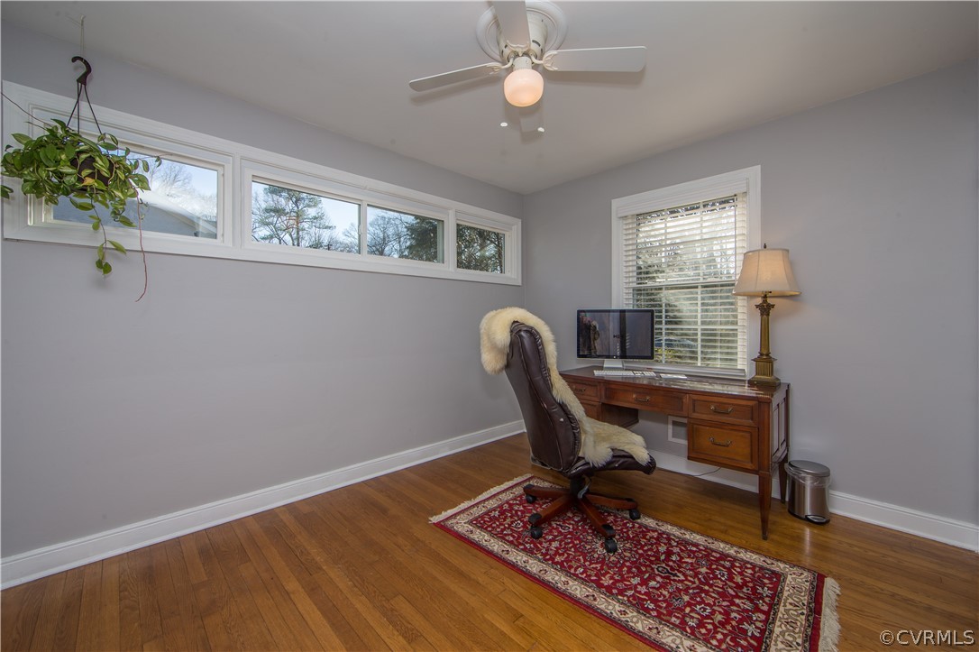 3921 Wakefield Road Richmond, VA 23235 - Photo 35 of 50 a view of a workspace with furniture and a window