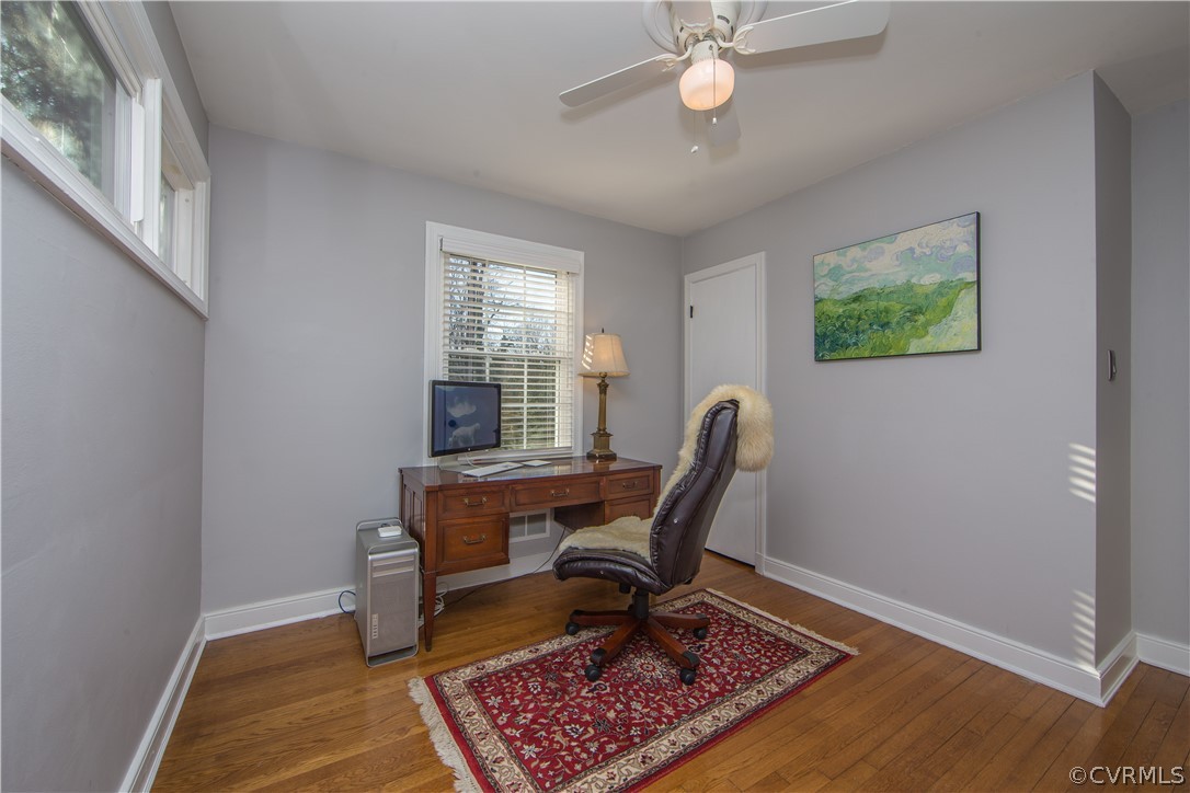 3921 Wakefield Road Richmond, VA 23235 - Photo 36 of 50 a view of a workspace with furniture and a window