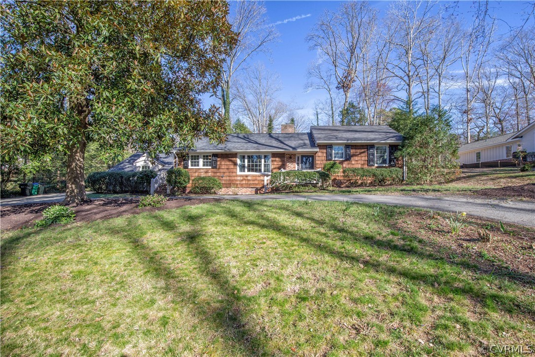 3921 Wakefield Road Richmond, VA 23235 - Photo 43 of 50 a front view of a house with a yard