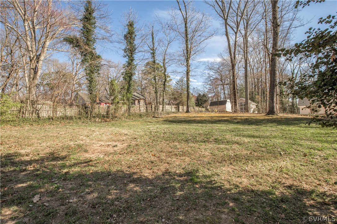 3921 Wakefield Road Richmond, VA 23235 - Photo 49 of 50 a backyard of apartments with large trees