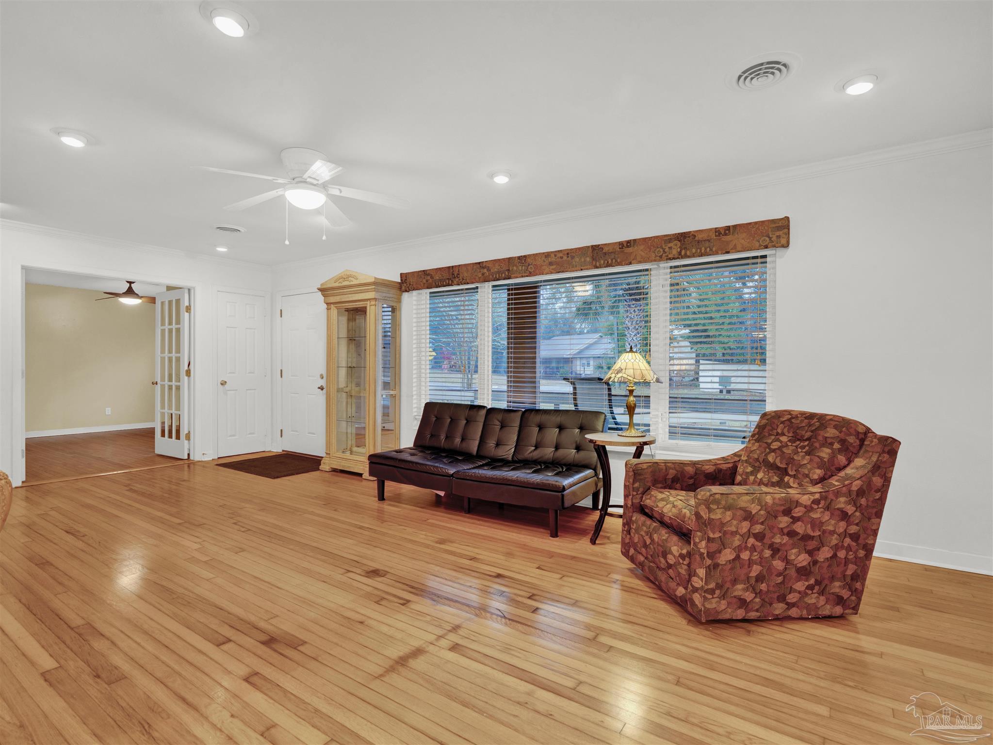 111 Euclid Road Pensacola, FL 32503 - Photo 15 of 34 a living room with furniture and a large window