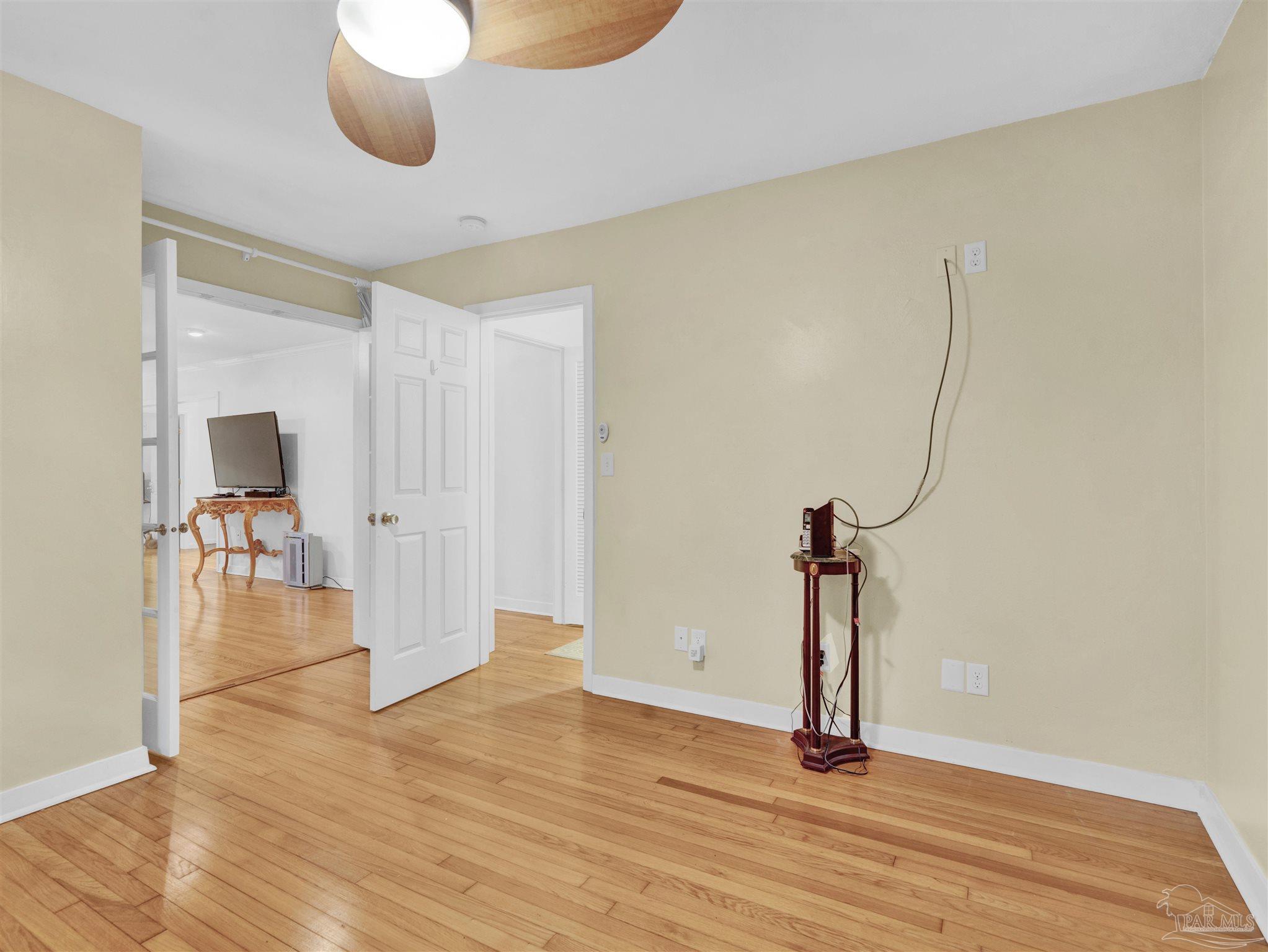 111 Euclid Road Pensacola, FL 32503 - Photo 22 of 34 a view of a room with wooden floor