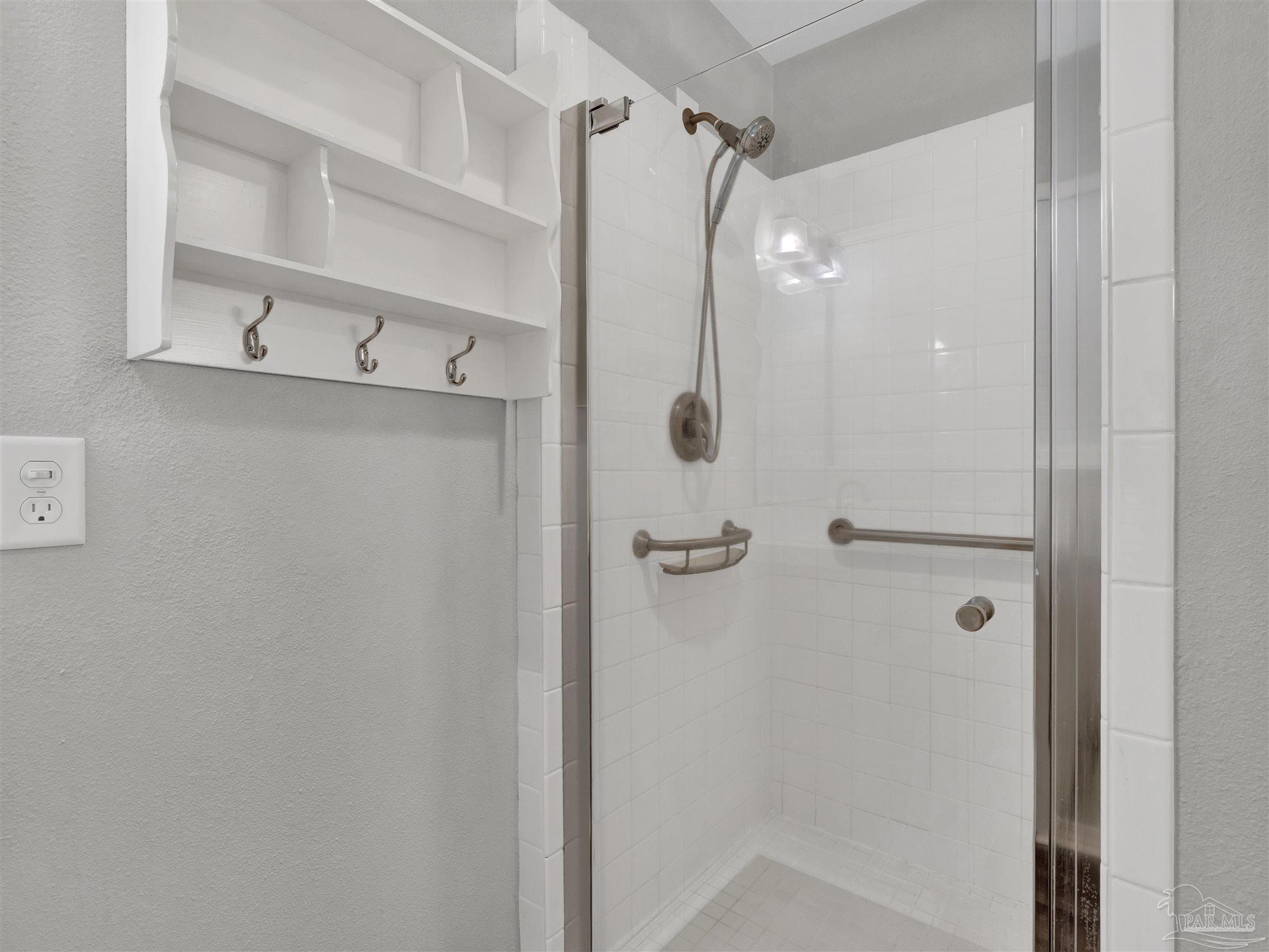 111 Euclid Road Pensacola, FL 32503 - Photo 5 of 34 a bathroom with a glass shower door