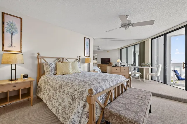 a view of a livingroom with furniture and window