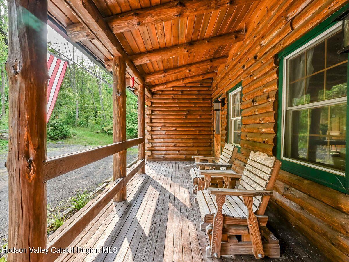104 Hunter Lane Hunter, NY 12442 - Photo 2 of 36 a view of two chairs in the balcony