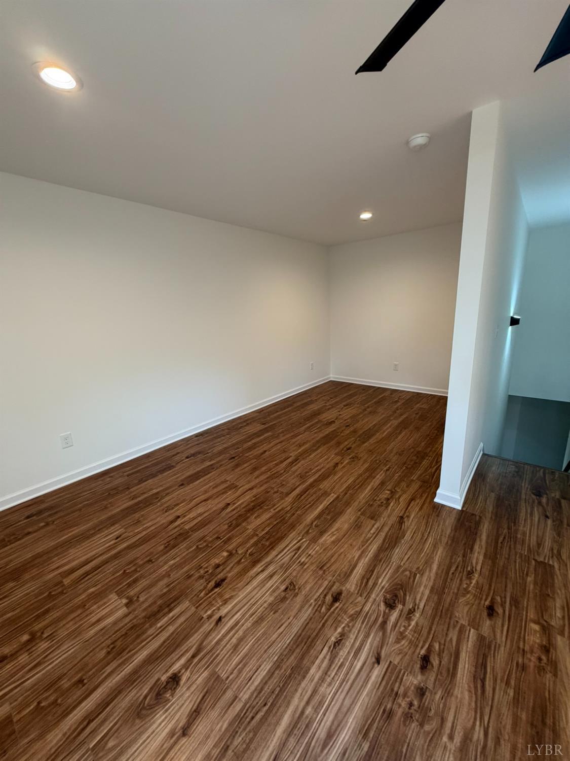 405 Hixburg Road Pamplin, VA 23958 - Photo 57 of 73 a view of empty room with wooden floor