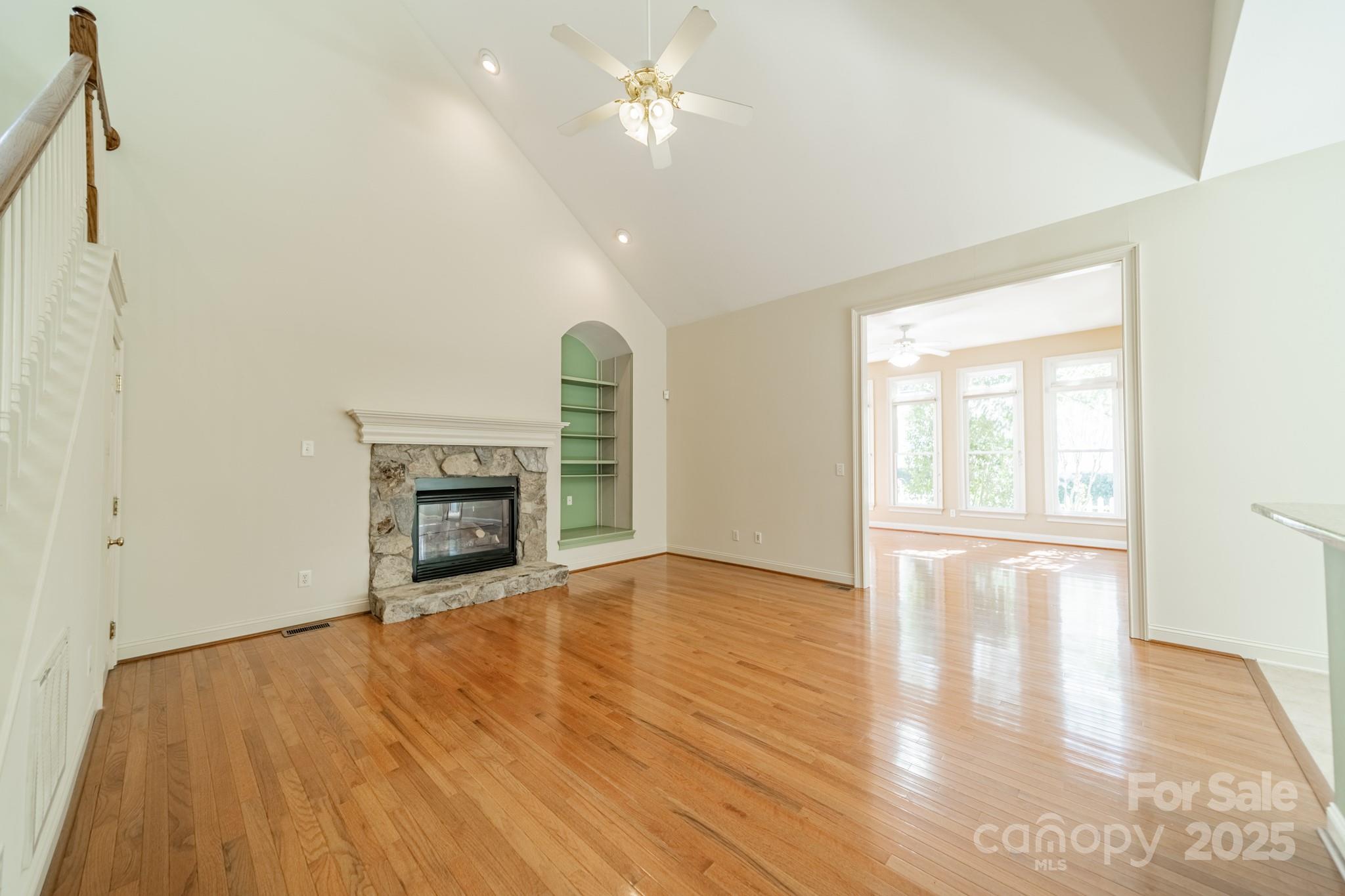 545 Glen Walk Drive Fort Mill, SC 29708 - Photo 11 of 48 a view of an empty room with a window and wooden floor