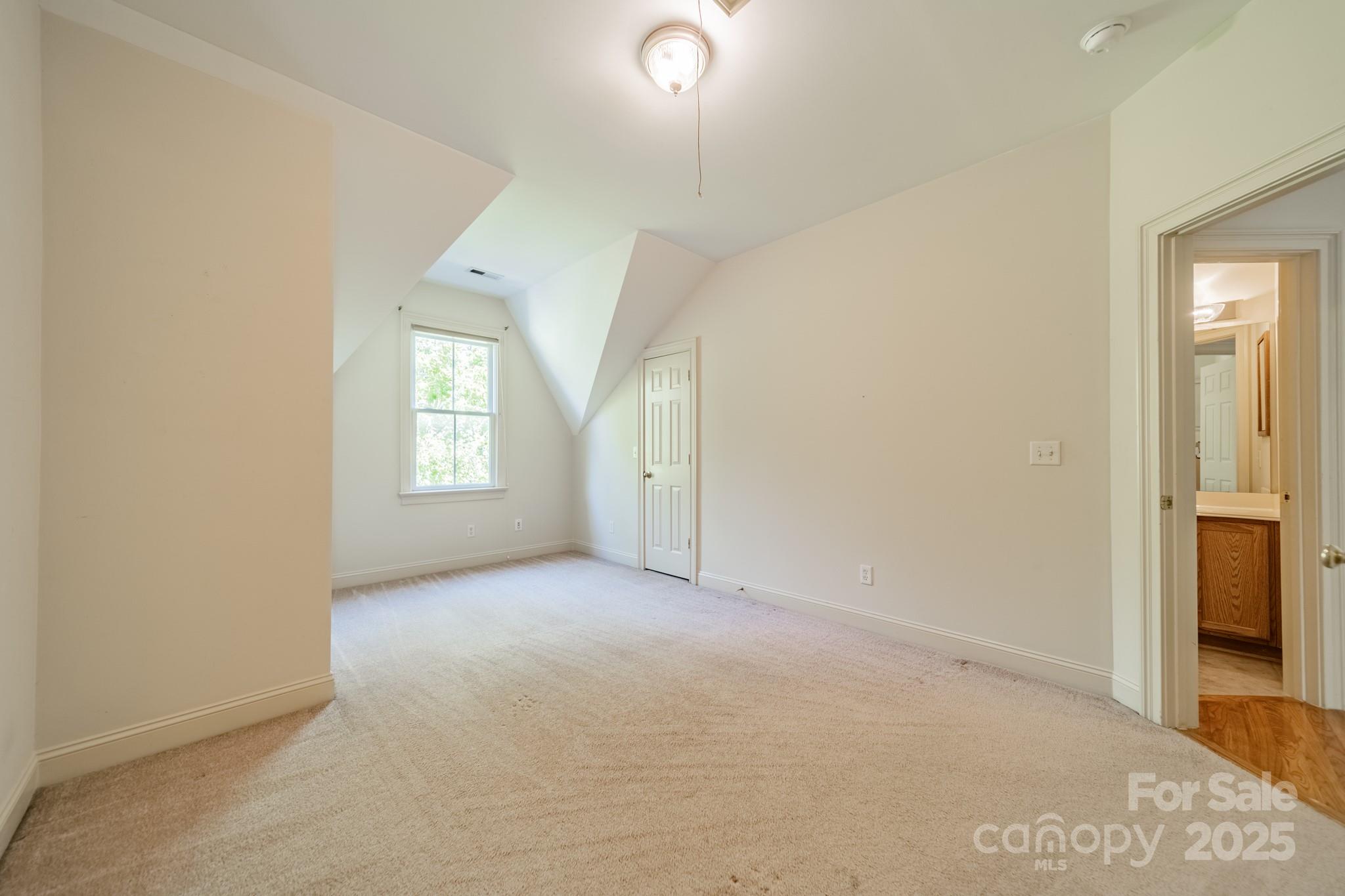 545 Glen Walk Drive Fort Mill, SC 29708 - Photo 30 of 48 an empty room with windows and closet