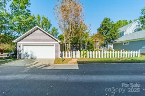a house view with a garden space