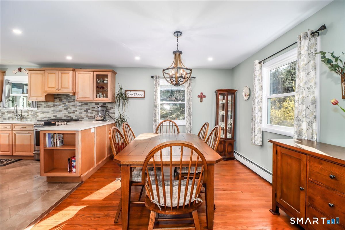 156 Stadley Rough Road Danbury, CT 06811 - Photo 8 of 32 Dining room just off the open kitchen with lots of natural light