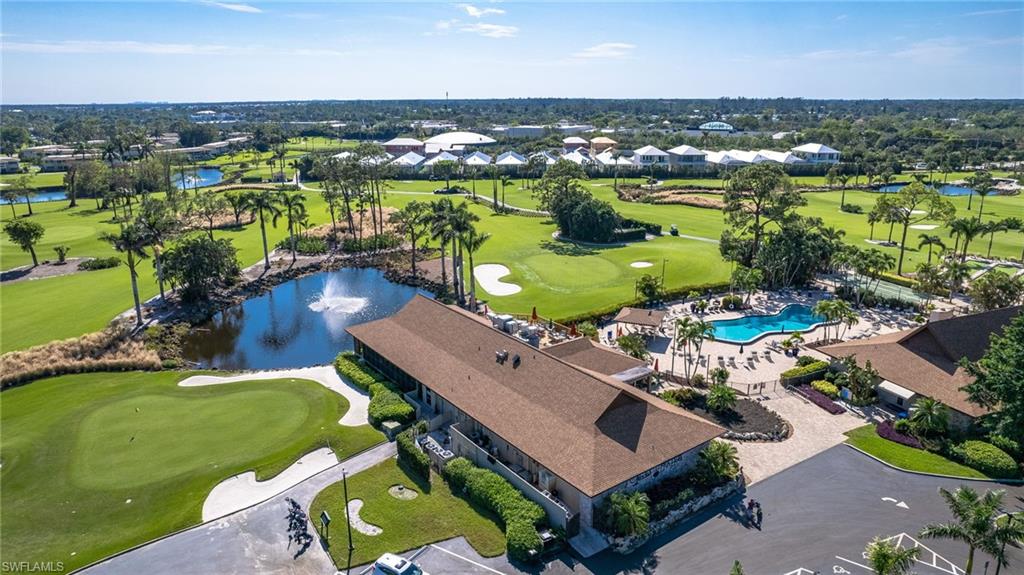 237 Palm Drive, Unit 1 Naples, FL 34112 - Photo 27 of 30 an aerial view of a house with a swimming pool yard and outdoor seating