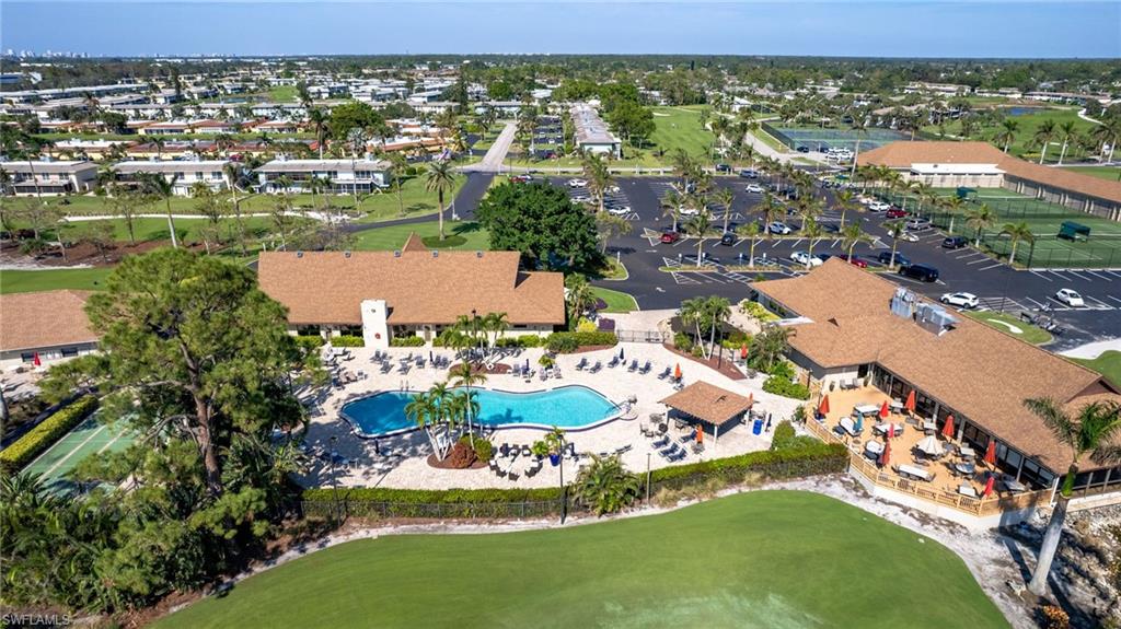 237 Palm Drive, Unit 1 Naples, FL 34112 - Photo 28 of 30 an aerial view of residential houses with outdoor space