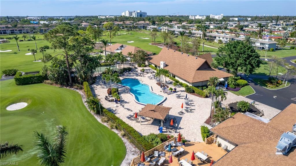 237 Palm Drive, Unit 1 Naples, FL 34112 - Photo 29 of 30 an aerial view of residential houses with outdoor space