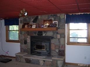 4350 Lake Pleasant Road North Branch, MI 48461 - Photo 12 of 21 Lower Level Fireplace
