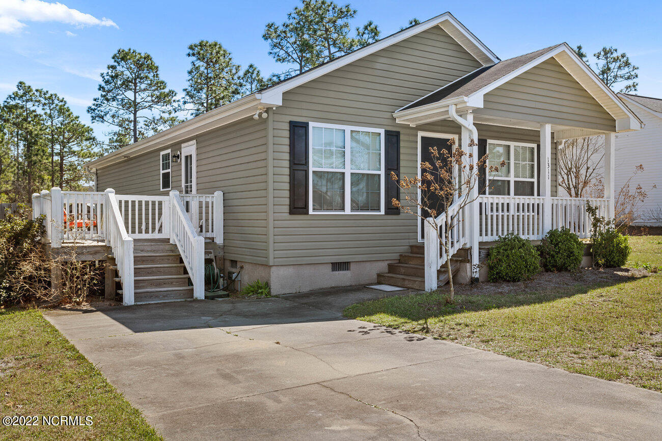 1311 Quail Ridge Loop Northeast Leland, NC 28451 - Photo 1 of 28 002_1311_quail_loop_ne-2