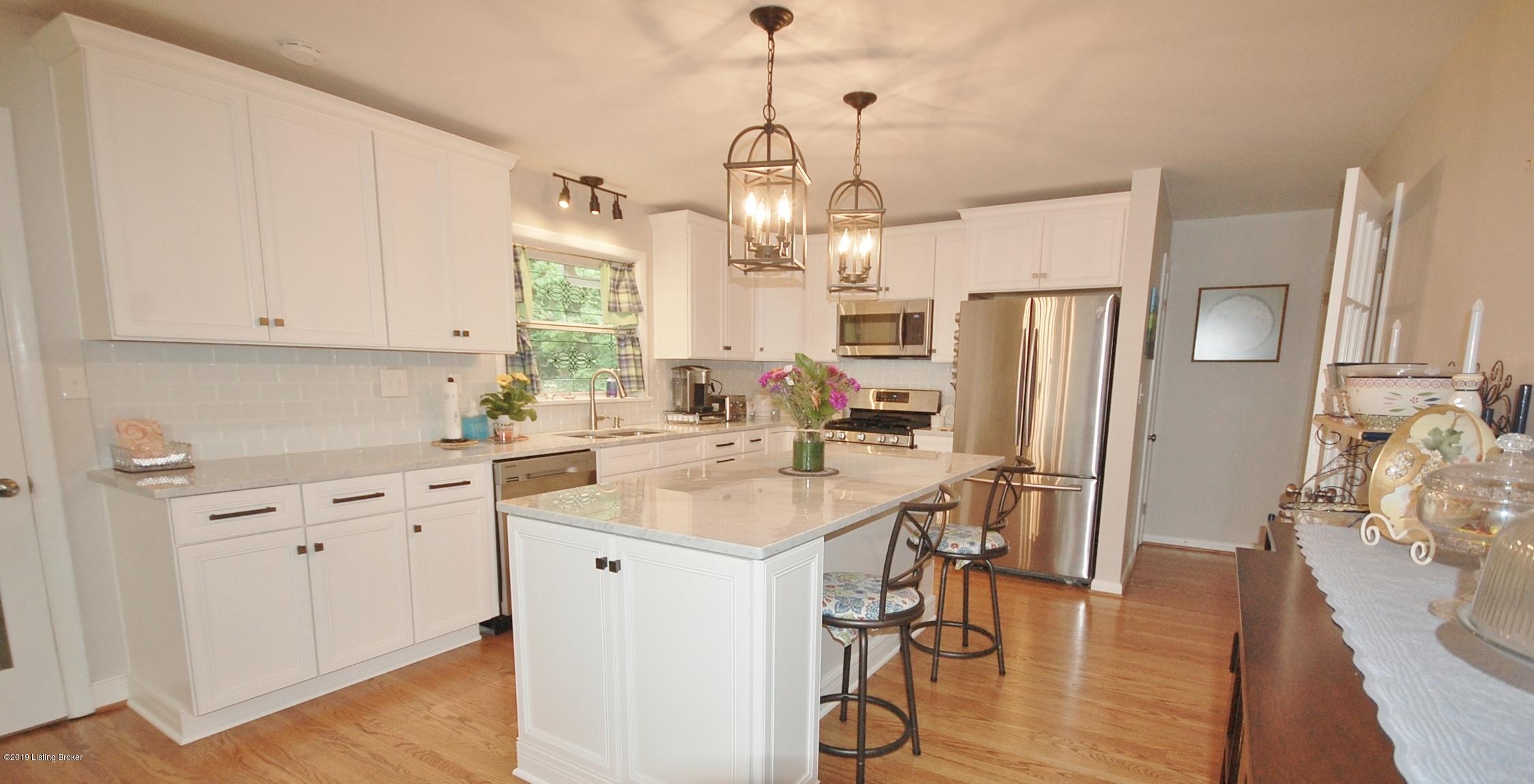 714 Antrim Road Louisville, KY 40207 - Photo 12 of 51 Spacious Kitchen with abundant cabinet and stone countertops.