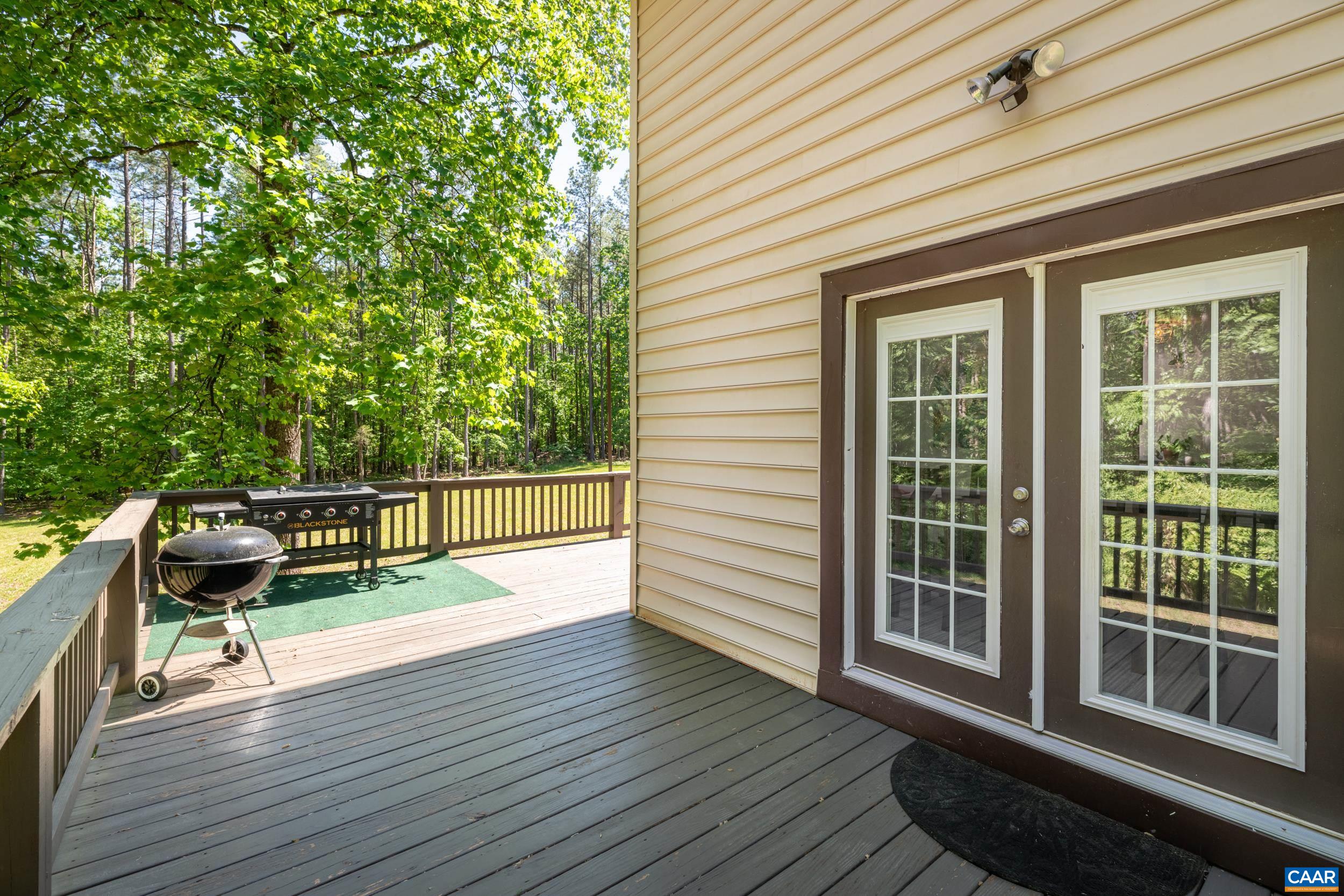 3101 Martin Kings Road Charlottesville, VA 22902 - Photo 16 of 60 a balcony with wooden floor and glass door