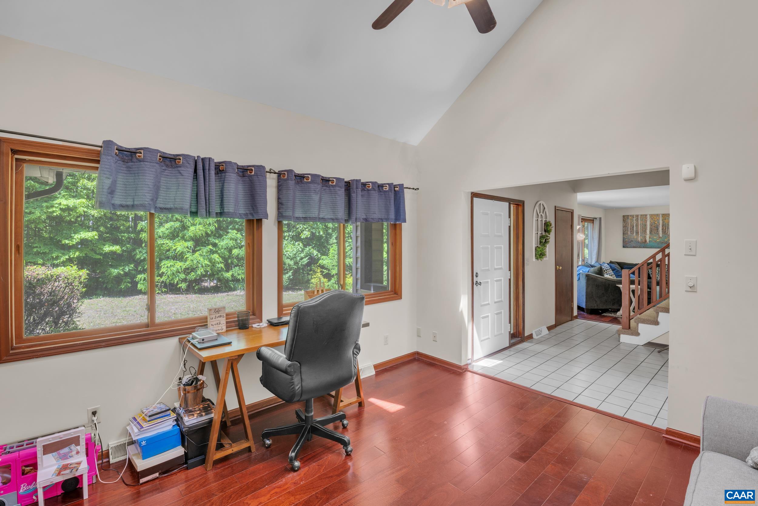 3101 Martin Kings Road Charlottesville, VA 22902 - Photo 19 of 60 a view of a workspace with furniture and a window