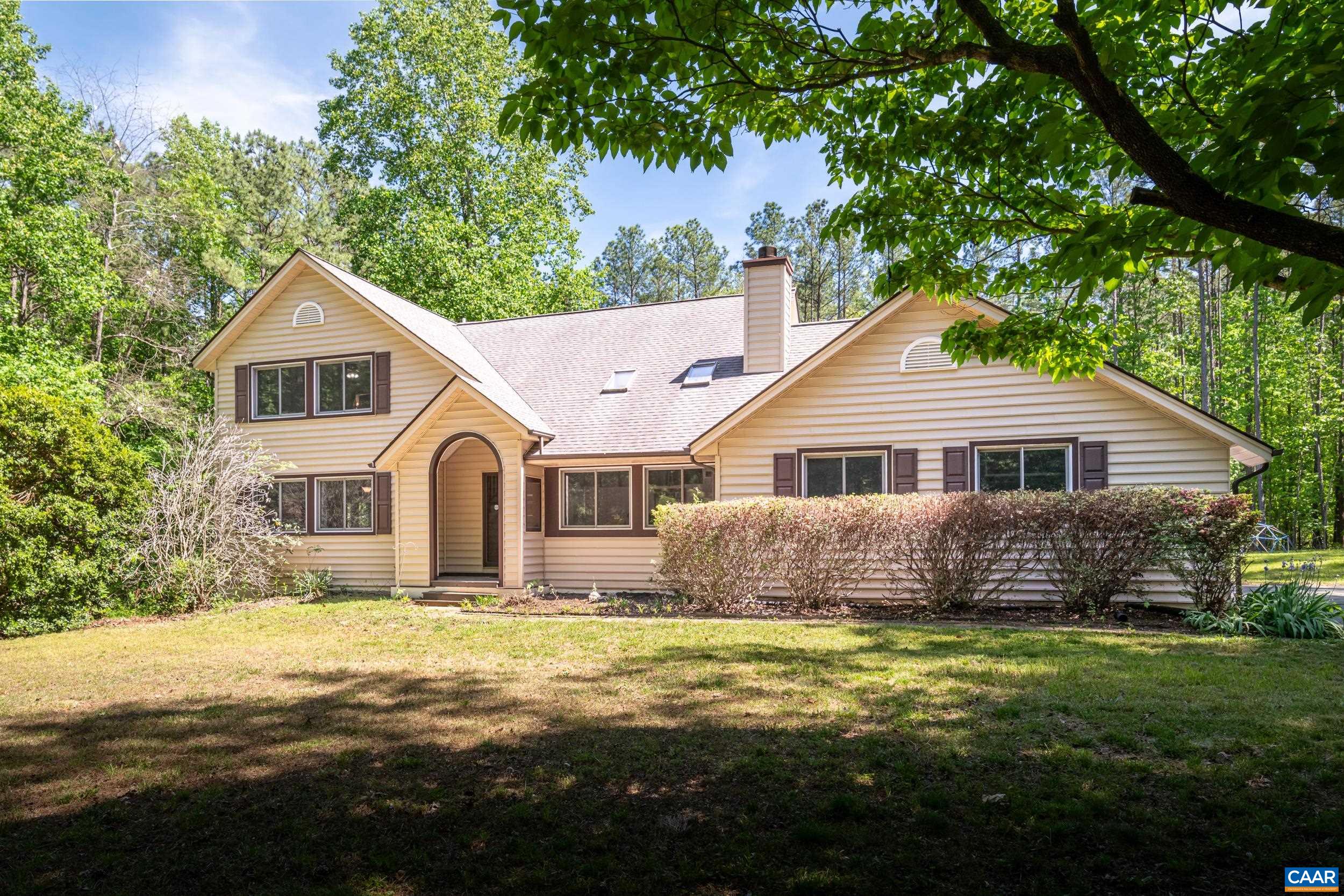 3101 Martin Kings Road Charlottesville, VA 22902 - Photo 3 of 60 a front view of a house with a garden and yard