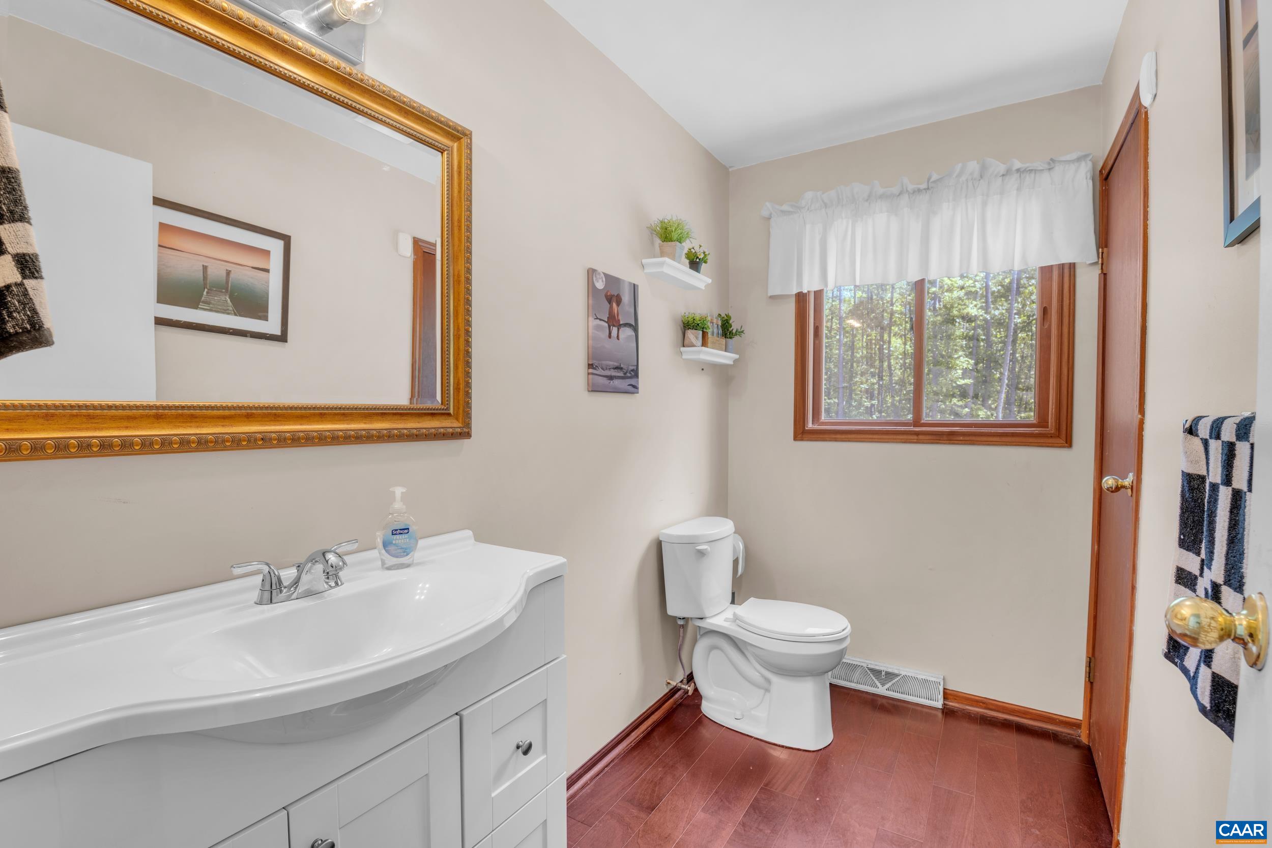 3101 Martin Kings Road Charlottesville, VA 22902 - Photo 36 of 60 a bathroom with a sink and a toilet