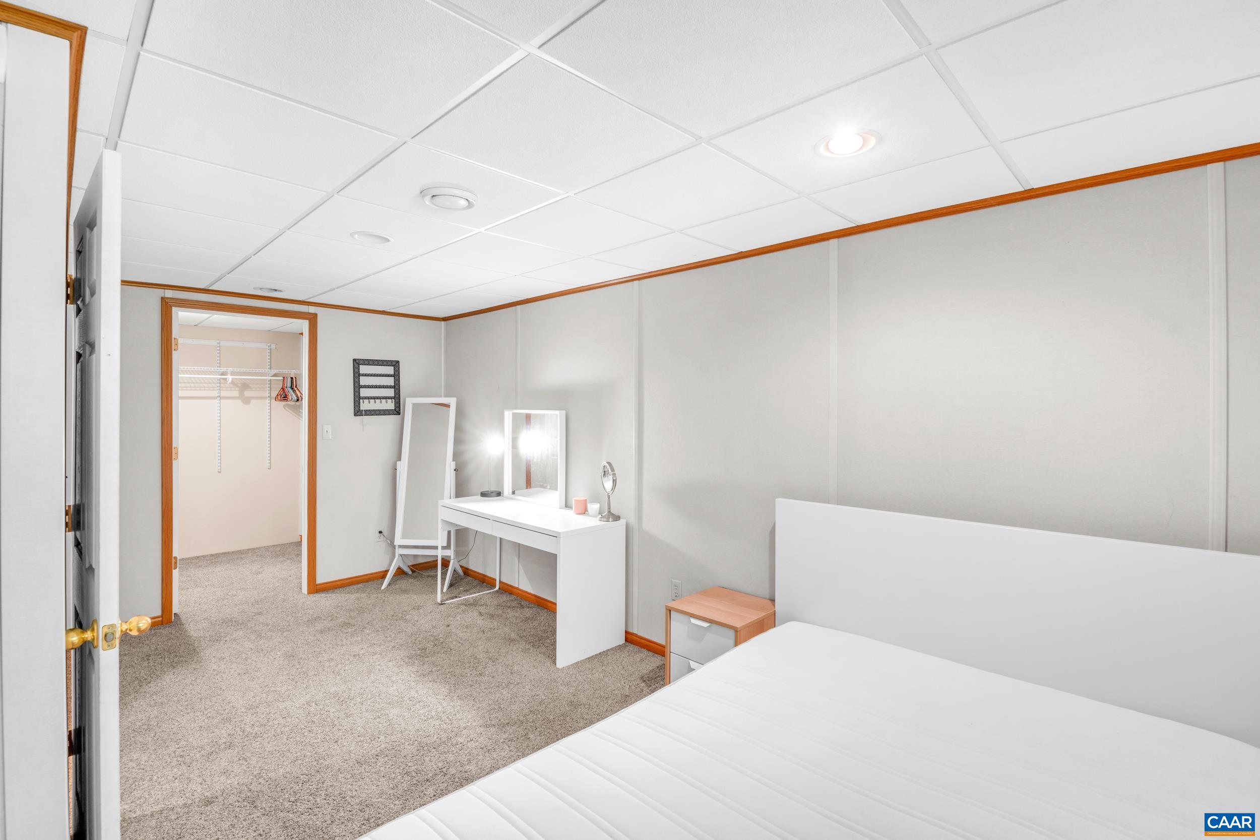 3101 Martin Kings Road Charlottesville, VA 22902 - Photo 54 of 60 a room with a bed and white walls