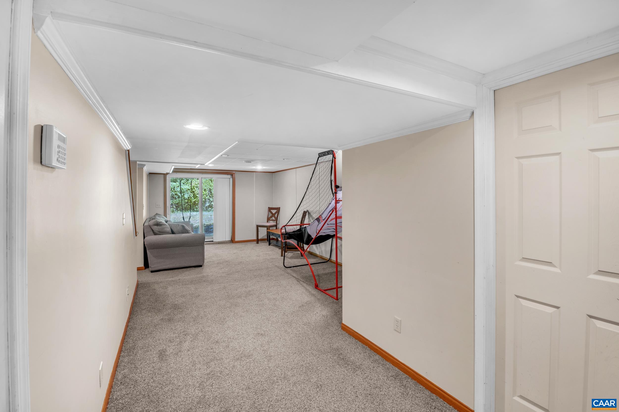 3101 Martin Kings Road Charlottesville, VA 22902 - Photo 57 of 60 a view of a livingroom with furniture and white walls