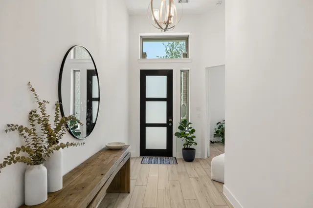 a view of entryway with wooden floor