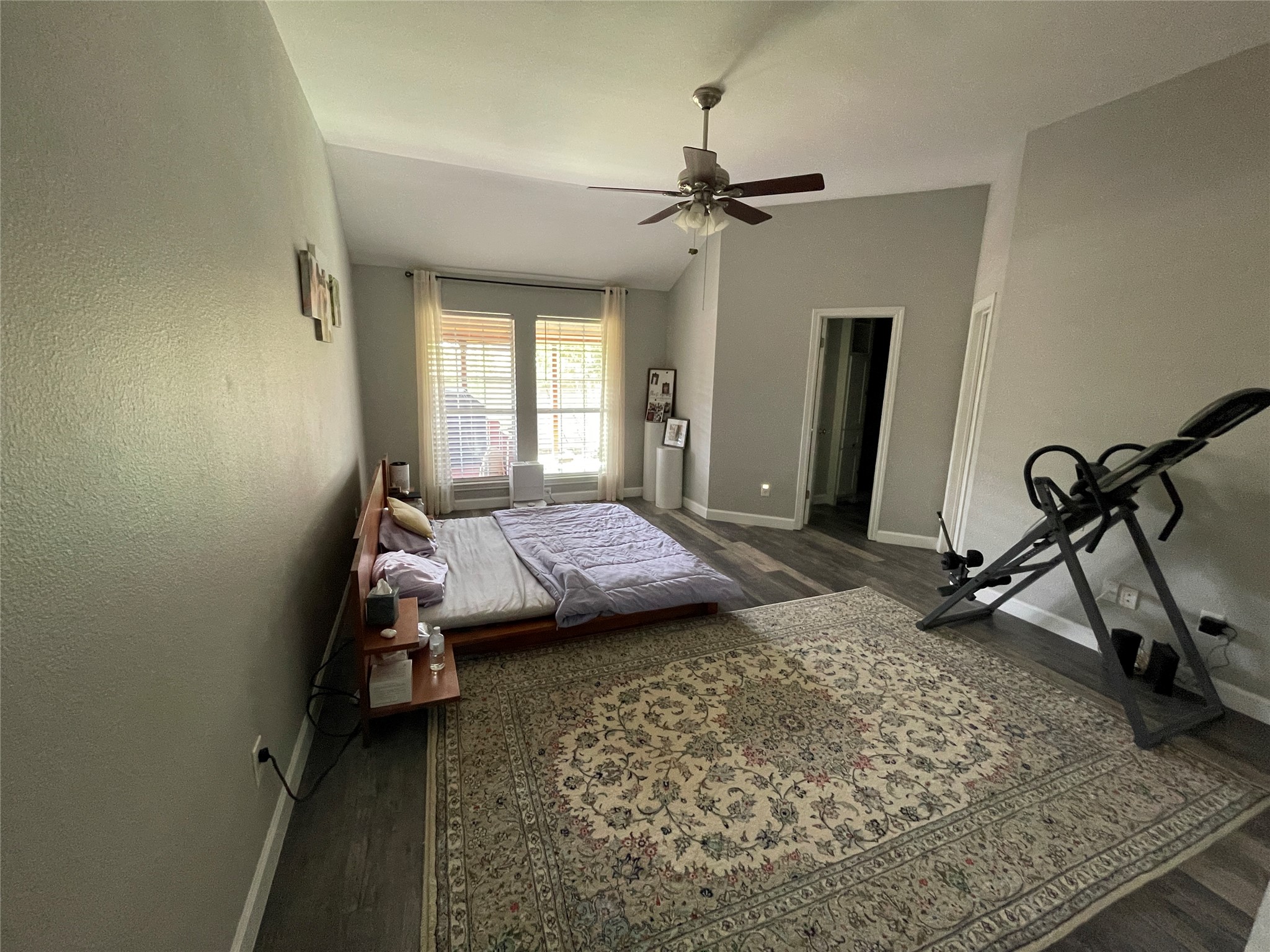 3023 Bent Tree Loop Round Rock, TX 78681 - Photo 9 of 18 Bedroom featuring dark wood-style flooring, a ceiling fan, and lofted ceiling