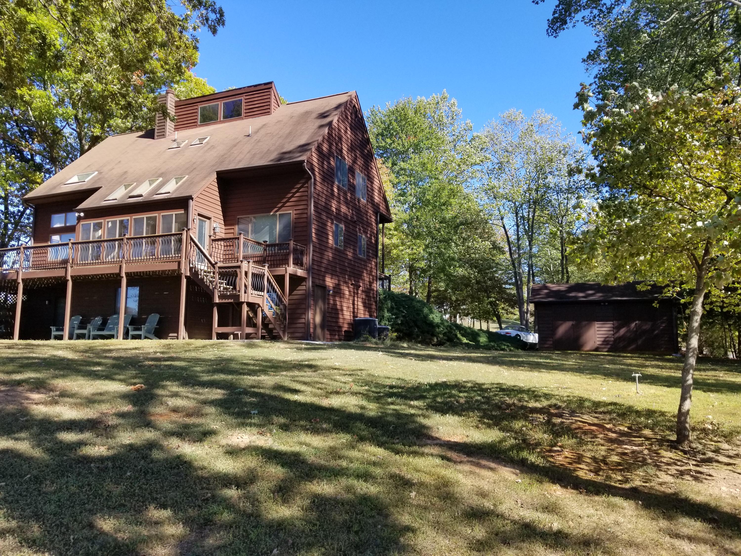 71 Penhook Point Penhook, VA 24137 - Photo 1 of 30 Home, carport and shed from lake