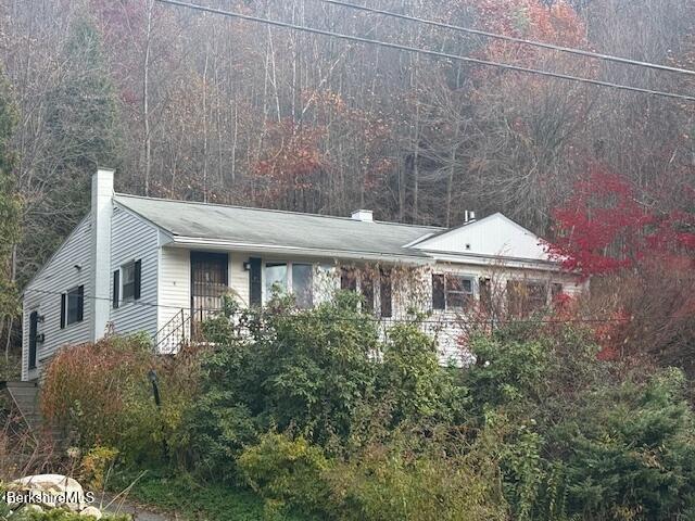 100 North Hoosac Road Williamstown, MA 01267 - Photo 1 of 25 a front view of a house with a garden