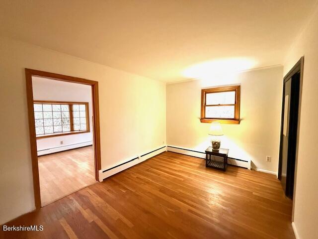 100 North Hoosac Road Williamstown, MA 01267 - Photo 11 of 25 a view of a livingroom with a flat screen tv and a large window