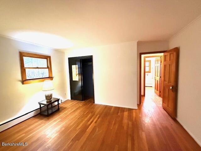 100 North Hoosac Road Williamstown, MA 01267 - Photo 12 of 25 a view of a room with wooden floor and a window