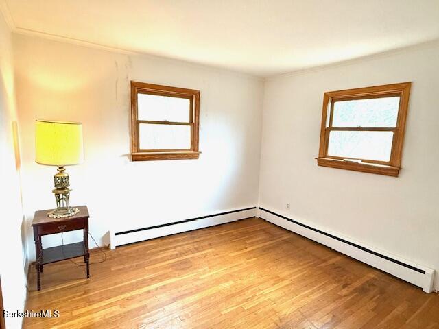 100 North Hoosac Road Williamstown, MA 01267 - Photo 13 of 25 a view of a room with wooden floor and a potted plant