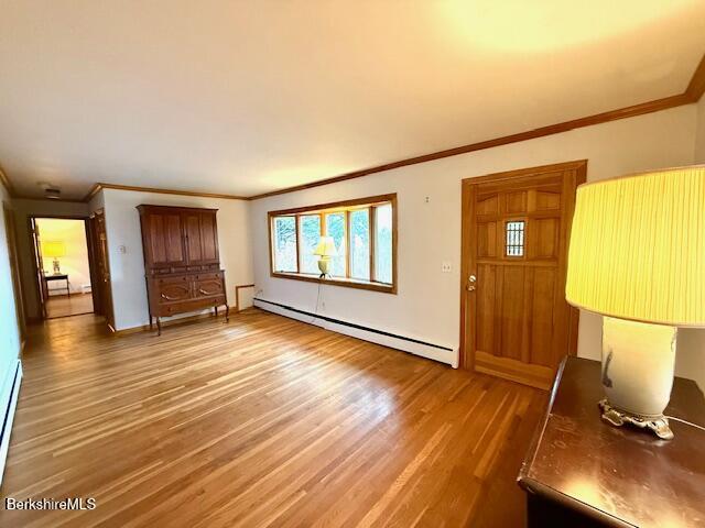 100 North Hoosac Road Williamstown, MA 01267 - Photo 3 of 25 a view of an empty room with wooden floor and a window