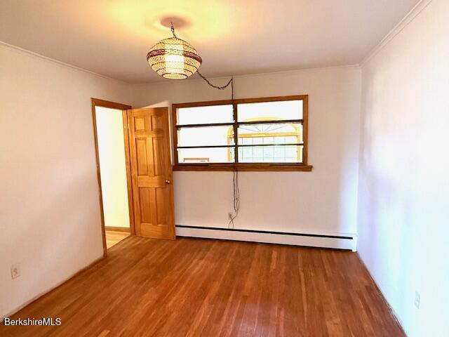 100 North Hoosac Road Williamstown, MA 01267 - Photo 6 of 25 an empty room with wooden floor and windows