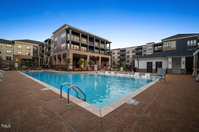 a view of a building with a swimming pool