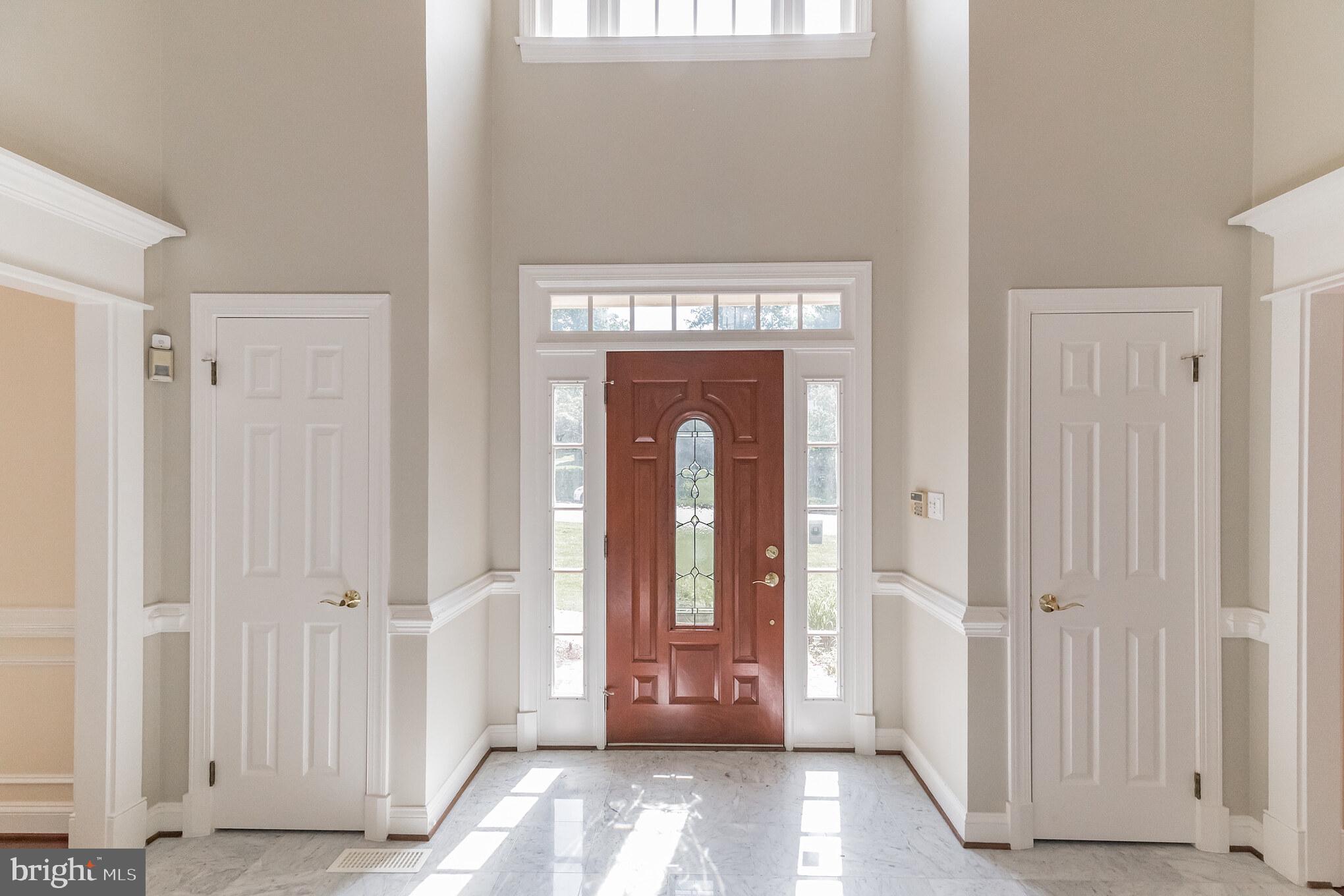 9731 Middleton Ridge Road Vienna, VA 22182 - Photo 3 of 39 a view of an entryway with wooden floor
