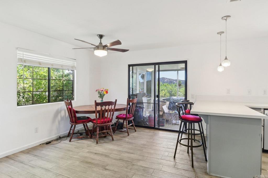 23833 Gymkhana Road Ramona, CA 92065 - Photo 7 of 29 a view of a dining room with furniture window and outside view