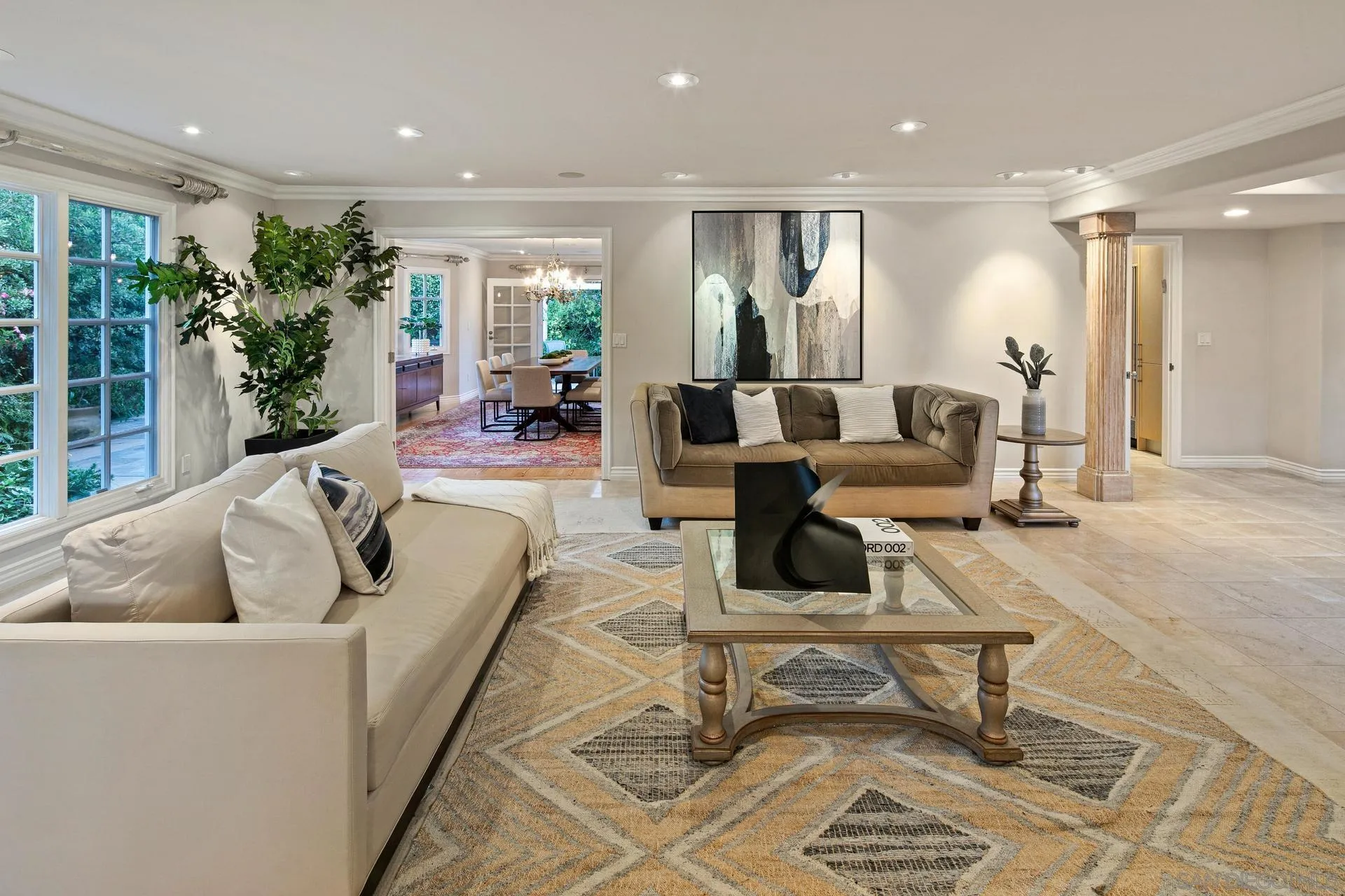 8491 Cliffridge Lane La Jolla, CA 92037 - Photo 11 of 38 a living room with furniture and a large window