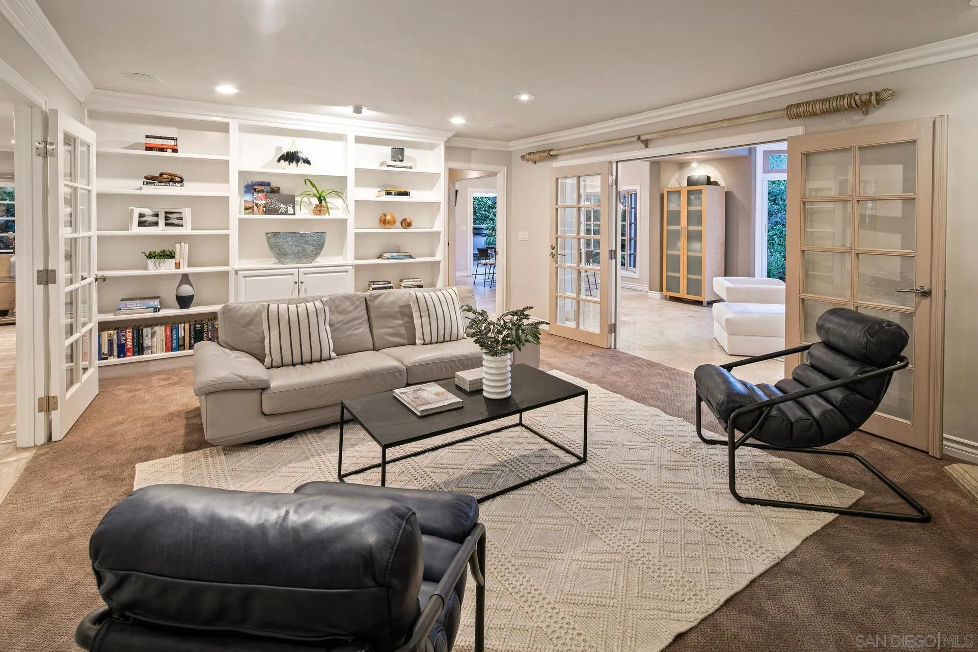 8491 Cliffridge Lane La Jolla, CA 92037 - Photo 27 of 38 a living room with furniture and a large window
