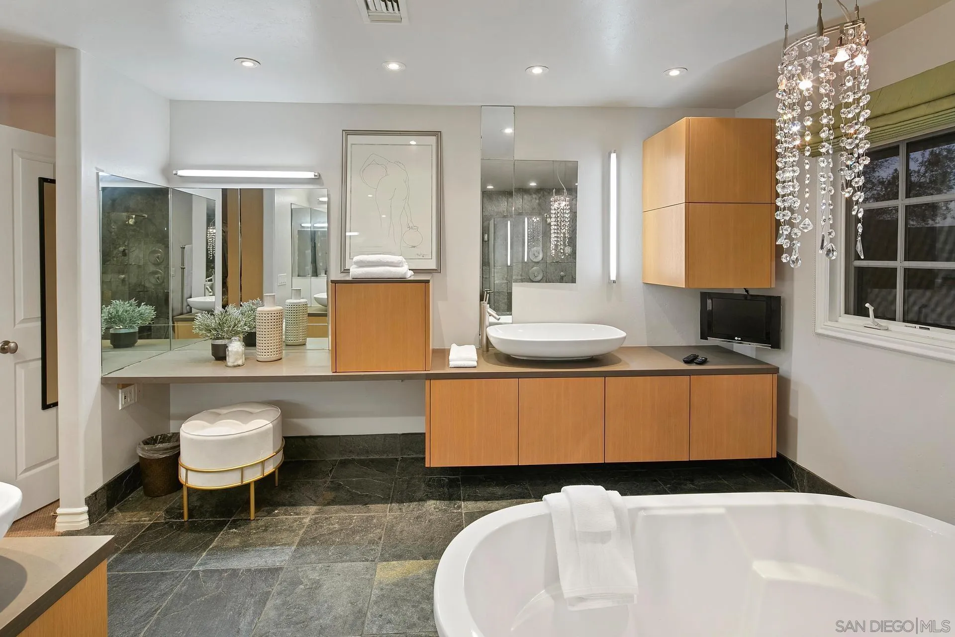 8491 Cliffridge Lane La Jolla, CA 92037 - Photo 35 of 38 a living room with furniture and a table