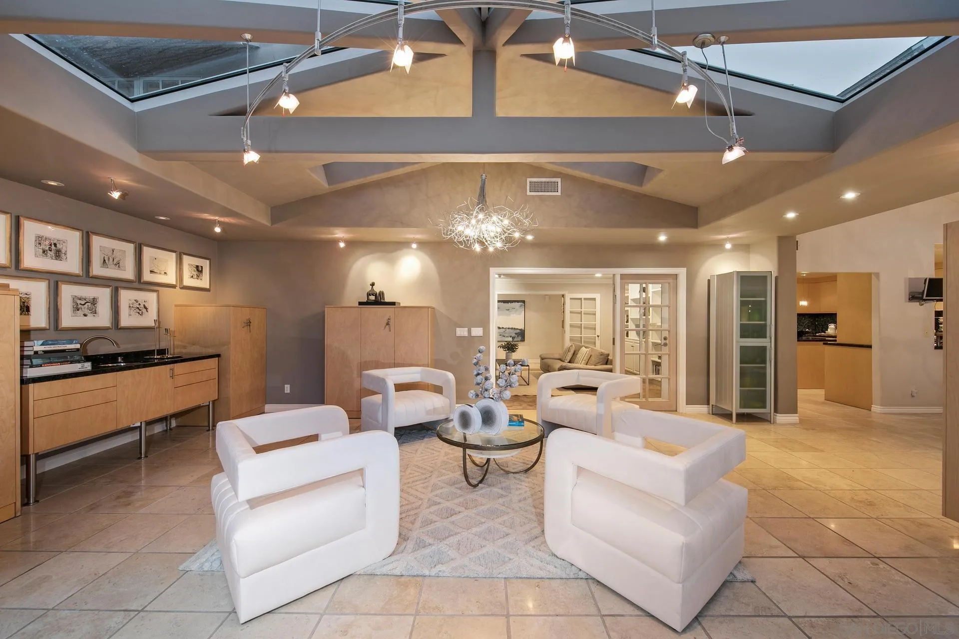 8491 Cliffridge Lane La Jolla, CA 92037 - Photo 6 of 38 a large white building with kitchen view and living room view