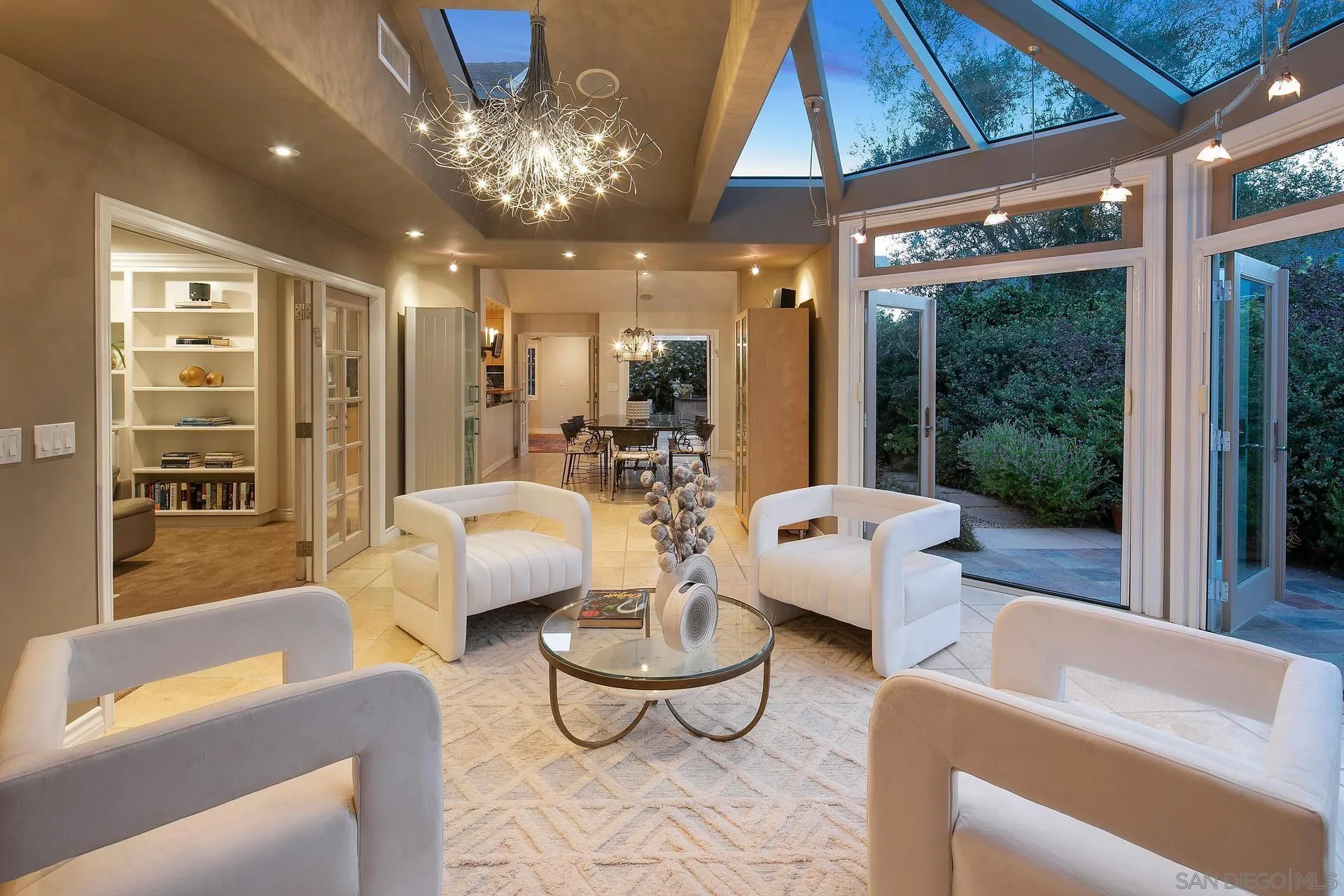 8491 Cliffridge Lane La Jolla, CA 92037 - Photo 8 of 38 a living room with furniture and a large window