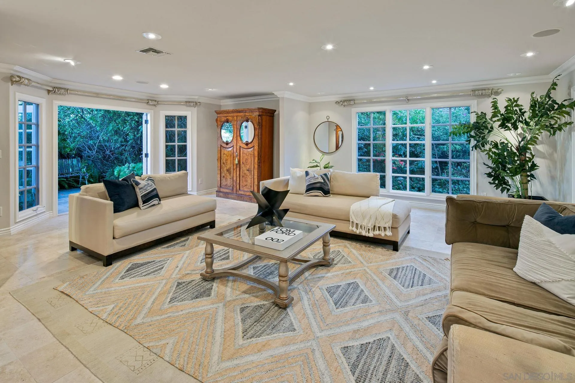 8491 Cliffridge Lane La Jolla, CA 92037 - Photo 9 of 38 a living room with furniture and a large window